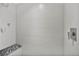 Modern shower with sleek tile walls and a marble bench at 6445 S Telluride St, Aurora, CO 80016