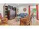 Cozy living room featuring hardwood floors, comfortable seating, and ample natural light at 1200 N Humboldt St # 101, Denver, CO 80218