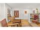 Bright living room with hardwood floors, and craftsman-style seating, decorated with Southwest-style artwork at 1200 N Humboldt St # 101, Denver, CO 80218