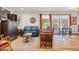 Inviting living room with natural light, hardwood floors, and stylish decor at 1200 N Humboldt St # 101, Denver, CO 80218