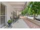 Inviting patio area with outdoor seating and a charming brick facade at 1200 N Humboldt St # 101, Denver, CO 80218