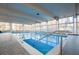 Indoor swimming pool bathed in natural light, offering a serene and inviting space for recreation and relaxation at 1200 N Humboldt St # 101, Denver, CO 80218