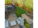 Inviting backyard features a patio, deck, seating area, and manicured lawn at 5394 S Gray St, Littleton, CO 80123