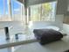 Inviting bathroom featuring a soaking tub with jets and a scenic window view at 5394 S Gray St, Littleton, CO 80123