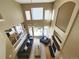 Spacious living room with high ceilings, fireplace, wood floors, and lots of natural light at 5394 S Gray St, Littleton, CO 80123