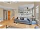 Inviting living room with wood floors, neutral paint, and an open floor plan at 5394 S Gray St, Littleton, CO 80123