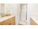 Modern bathroom with a glass-enclosed shower, clean lines, and stylish fixtures at 8711 E Hampden Ave # 26, Denver, CO 80231