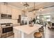 Bright, open kitchen with stainless steel appliances and a large island, perfect for entertaining at 8711 E Hampden Ave # 26, Denver, CO 80231