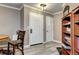 Inviting entryway with wood-look flooring, neutral paint, and practical built-ins, creating a welcoming ambiance at 12183 W Cross Dr # 202, Littleton, CO 80127