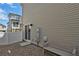 Cozy backyard with sliding door access, low maintenance gravel, and seating area at 18233 E 51St Ave, Denver, CO 80249