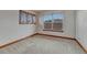 Carpeted bedroom with a view, a window with blinds, and neutral paint at 6556 S Versailles Ct, Aurora, CO 80016