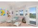 Charming breakfast nook featuring a bay window with scenic mountain views at 606 Sugarloaf Mountain Rd, Boulder, CO 80302