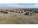 Neighborhood aerial shot showcasing tidy lawns and a friendly atmosphere with easy access to community amenities at 902 William Way, Brighton, CO 80603