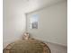 Neutral bedroom with a decorative carpet, window, and comfortable carpeting at 902 William Way, Brighton, CO 80603
