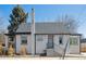 Charming home with brick exterior, gray trim, and a well-maintained front yard at 4022 E 17Th Avenue Pkwy, Denver, CO 80220