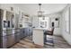 Eat-in kitchen features stainless steel refrigerator and lots of natural light at 4022 E 17Th Avenue Pkwy, Denver, CO 80220
