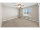 Bedroom with neutral walls and a large window, offering great natural light at 15715 Carob Cir, Parker, CO 80134