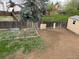 Backyard showcasing garden area, wooden fence, and additional storage shed at 10630 Routt Way, Broomfield, CO 80021