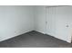 Bedroom featuring a closet with sliding doors and neutral carpeting at 10630 Routt Way, Broomfield, CO 80021