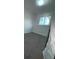 Bedroom featuring gray carpet and a window for ample natural light at 10630 Routt Way, Broomfield, CO 80021