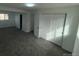 Spacious bedroom with large closet, neutral carpet, and natural light at 10630 Routt Way, Broomfield, CO 80021