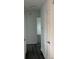 Hallway with new paint and doors leads to other rooms at 10630 Routt Way, Broomfield, CO 80021