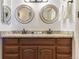 The bathroom features double sinks and granite countertops at 2375 S Linden Ct # 118, Denver, CO 80222
