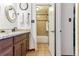 This bathroom features a single sink with a shower and bath combo at 2375 S Linden Ct # 118, Denver, CO 80222