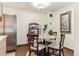 Cozy dining area with a marble-topped table and seating for four at 2375 S Linden Ct # 118, Denver, CO 80222