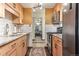 Modern kitchen featuring stainless steel appliances and ample counter space at 2375 S Linden Ct # 118, Denver, CO 80222