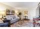 Comfortable living room with neutral tones, plush seating, and decor at 2375 S Linden Ct # 118, Denver, CO 80222
