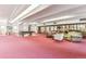 Large recreation room featuring a pool table and seating at 2375 S Linden Ct # 118, Denver, CO 80222