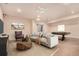 Entertainment area with a couch, billiard table and decorations at 13015 Tamarac Pl, Thornton, CO 80602