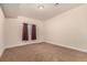 Bedroom area with a carpeted floor, recessed lighting, and a window at 13015 Tamarac Pl, Thornton, CO 80602