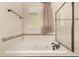 A relaxing bath with jets at 13015 Tamarac Pl, Thornton, CO 80602