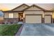 Inviting single-Gathering home with a three-car garage, stone accents, and a well-manicured lawn at 13015 Tamarac Pl, Thornton, CO 80602