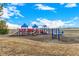 Colorful playground in a community park offering recreational space for children and families to enjoy at 13015 Tamarac Pl, Thornton, CO 80602