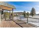 Expansive deck with mountain views surrounded by beautiful trees at 31008 Big Bear Dr, Evergreen, CO 80439