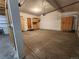 Spacious garage with built-in storage cabinets for organization and convenience at 31008 Big Bear Dr, Evergreen, CO 80439