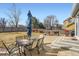 Spacious backyard with a patio area, outdoor furniture, and a well-maintained lawn perfect for outdoor living at 4027 Hawthorne Cir, Longmont, CO 80503