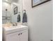 Bathroom featuring a white vanity, framed mirror, and neutral wall color at 4027 Hawthorne Cir, Longmont, CO 80503