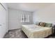 Simple bedroom featuring neutral colors and a closet at 4027 Hawthorne Cir, Longmont, CO 80503