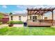 Backyard featuring an outdoor patio and deck perfect for entertaining at 1750 Clark Dr, Erie, CO 80516