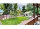 Lush backyard with a well-maintained lawn and storage shed at 1750 Clark Dr, Erie, CO 80516
