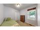 Cozy bedroom with natural light, closet, and dresser for ample storage at 1750 Clark Dr, Erie, CO 80516