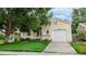 Charming home with a well-manicured lawn and a two-car garage at 1750 Clark Dr, Erie, CO 80516