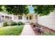Inviting front porch with wooden columns and planter boxes, creating a warm welcome at 1750 Clark Dr, Erie, CO 80516