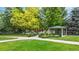 Playground with a covered picnic area and manicured landscaping at 1750 Clark Dr, Erie, CO 80516