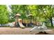 Neighborhood playground with slides, climbing structures, and a toy spaceship at 1750 Clark Dr, Erie, CO 80516