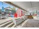 The backyard patio features a hot tub, a shed, and stylish seating at 1025 Zang St, Golden, CO 80401